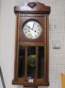 A VINTAGE WALL CLOCK