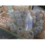 A QUANTITY OF RETRO GLASS EMPTY MILK BOTTLES