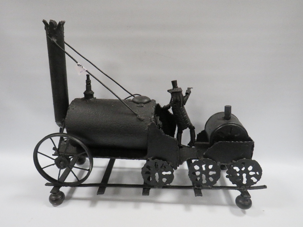 A METAL FOLK ART MODEL OF 'THE ROCKET' LOCOMOTIVE - Image 4 of 5