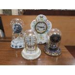 FOUR DECORATIVE MANTLE CLOCKS TO INCLUDE THREE UNDER GLASS DOMES COMPRISING AN ELVIS PRESLEY