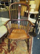 AN ANTIQUE WINDSOR HOOPBACK CHAIR TOGETHER WITH A STANDARD LAMP (2)
