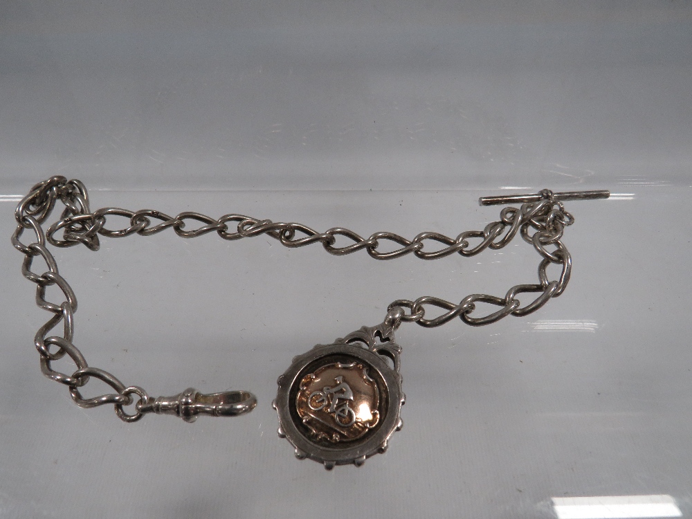 AN ANTIQUE SILVER GENTS POCKET WATCH ALBERT CHAIN