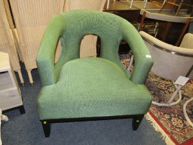 A MODERN GREEN OVER-SIZED OPEN ARMCHAIR