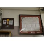 A LARGE FRAMED ANTIQUE INDENTURE TOGETHER WITH A FRAMED VINTAGE MOTORCYCLE DISPLAY (2)