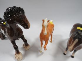 THREE BAY BESWICK HORSES TO INCLUDE A CANTERING SHIRE