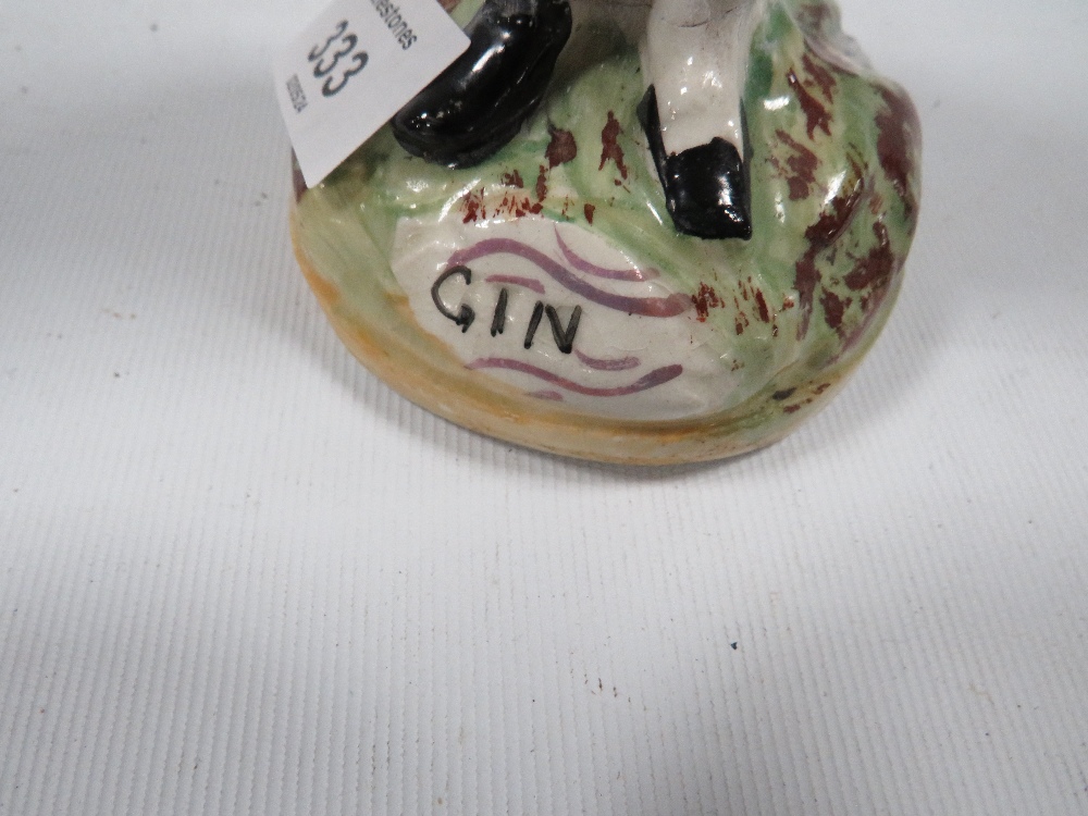 A STAFFORDSHIRE STYLE DOUBLE SIDED GIN / WATER FIGURE A/F - Image 2 of 4