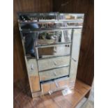 A MIRRORED DRESSING TABLE JEWELLERY BOX, CHEST OF DRAWERS WITH CONTENTS