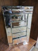 A MIRRORED DRESSING TABLE JEWELLERY BOX, CHEST OF DRAWERS WITH CONTENTS