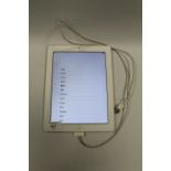 A 16GB WHITE APPLE iPAD WITH CHARGING CABLE - NOT CHECKED