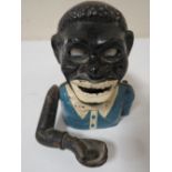 A HAPPY JOE MONEY BANK WITH BLUE JACKET AND EYES