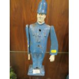 AN UNUSUAL WOODEN FIGURE OF A POLICEMAN
