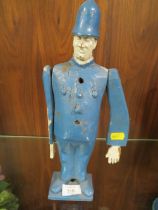 AN UNUSUAL WOODEN FIGURE OF A POLICEMAN
