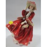 A ROYAL DOULTON FIGURINE "TOP O THE HILL"