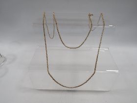 A ROLLED GOLD LONG MUFF CHAIN