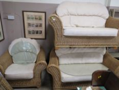A LARGE SIX PIECE WICKER CONSERVATORY SUITE