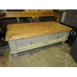 A PAINTED PINE TWO DRAWER LARGE COFFEE TABLE 140 X 76 CM