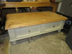 A PAINTED PINE TWO DRAWER LARGE COFFEE TABLE 140 X 76 CM