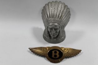 A REPRODUCTION GUY MOTORS LTD NATIVE AMERICAN INDIAN TOGETHER WITH A MODERN BRASS BENTLEY BADGE WITH