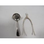 A PAIR OF HALLMARKED SILVER WISHBONE SUGAR TONGS TOGETHER WITH A HALLMARKED SILVER SIFTER SPOON (2)