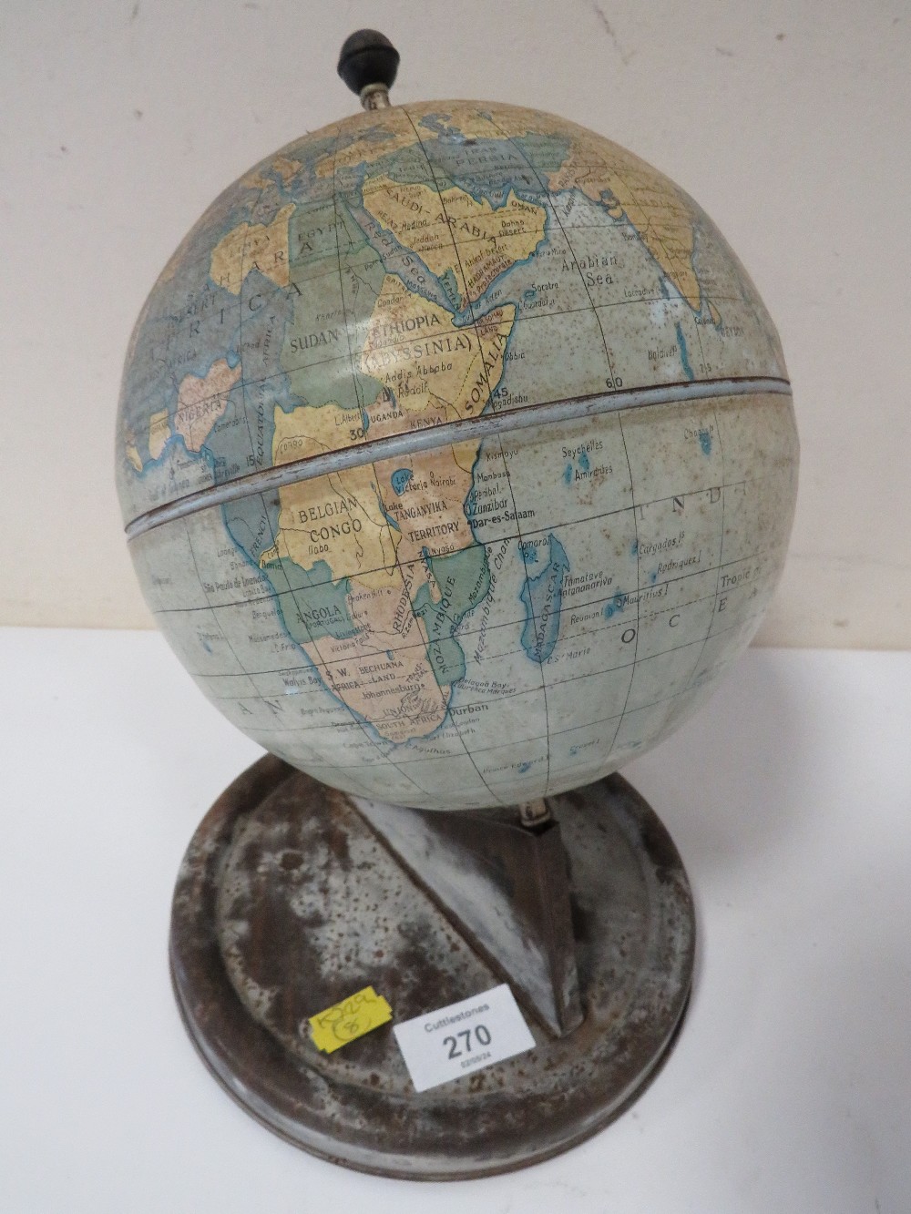 A VINTAGE METAL GLOBE ON STAND