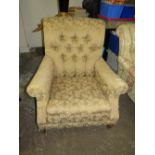 A 'HOWARD & SONS' STYLE COUNTRY HOUSE ARMCHAIR