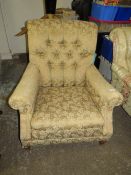 A 'HOWARD & SONS' STYLE COUNTRY HOUSE ARMCHAIR