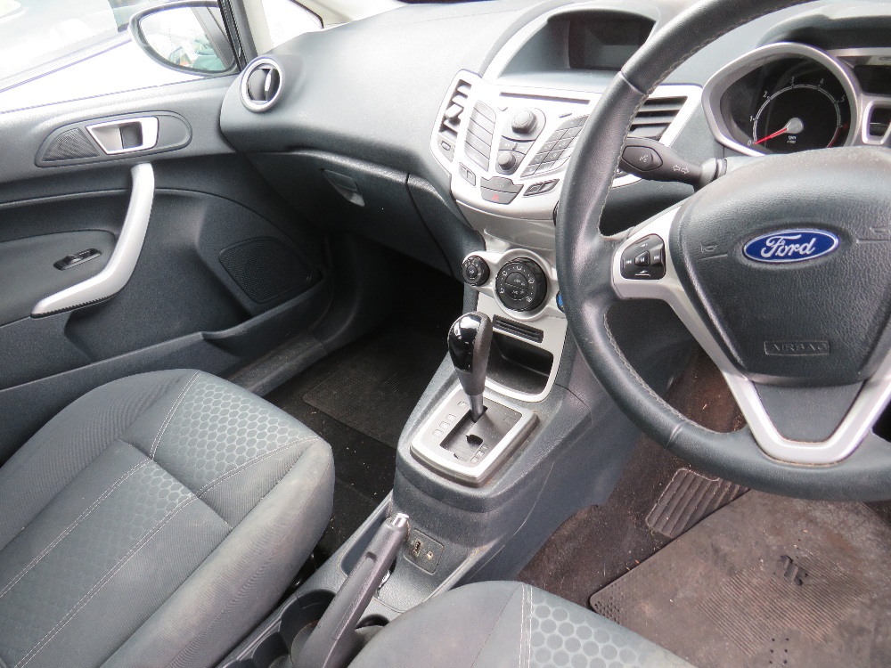 A BLACK 2011 1.4L PETROL FORD FIESTA 'BF61 HVR', LOG BOOK, TWO KEYS, CURRENTLY SORN, MILEAGE AT LAST - Image 11 of 12