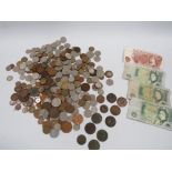 A QUANTITY OF COINS AND NOTES
