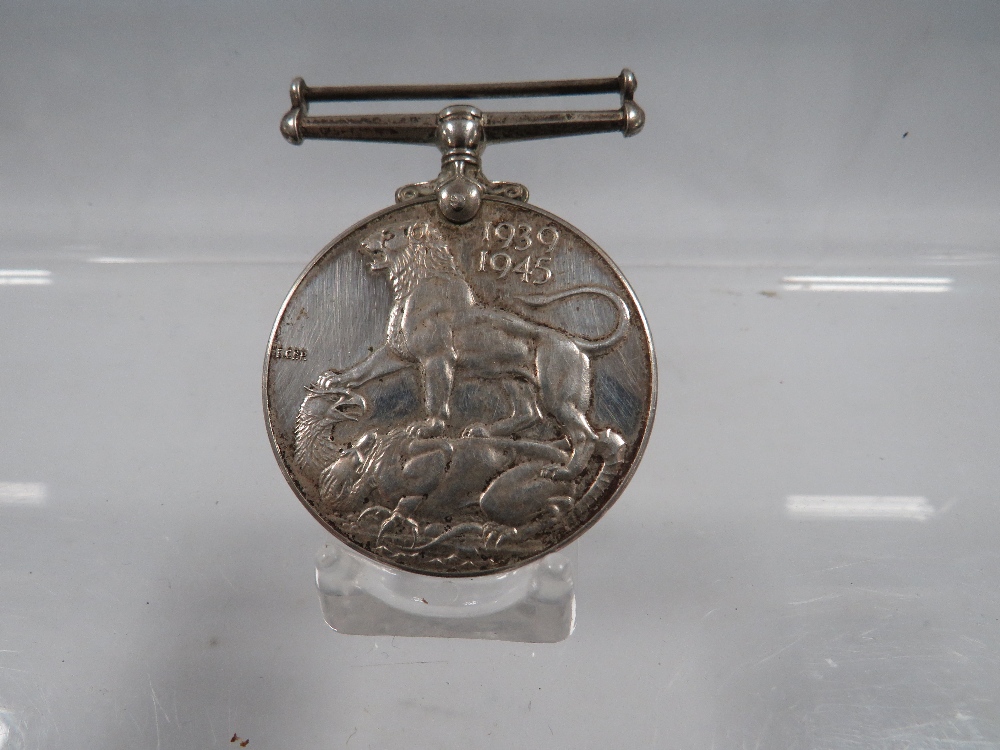 A SILVER 1939 - 1945 WAR MEDAL