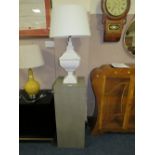 A MODERN GREY PEDESTAL AND A WHITE TABLE LAMP & SHADE (2)