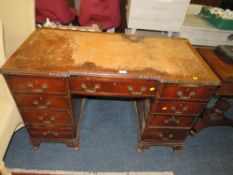 A MAHOGANY TWIN PEDESTAL DESK WITH INSET LEATHER TOP - W 121 CM A/F