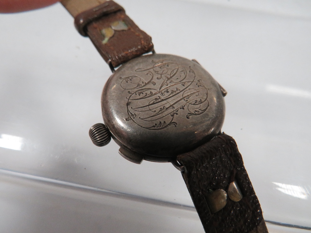 AN ANTIQUE TRENCH WRISTWATCH WITH SILVER HUNTING STYLE CASE - Image 3 of 4