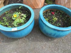 A PAIR OF EXTRA LARGE BLUE CERAMIC GARDEN PLANTERS