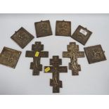 A COLLECTION OF SIX ROUGH CAST BRASS ORTHODOX CRUCIFIXES AND ST GEORGE PLAQUE, MADE FOR THE