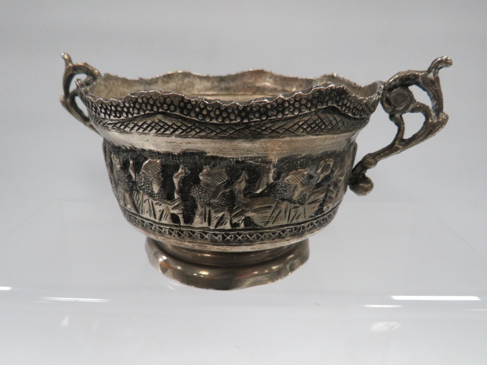 A HALLMARKED SILVER TOPPED GLASS MUSTARD POT ALONG WITH AN EASTERN WHITE METAL TWIN HANDLED BOWL AND - Image 2 of 4