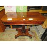 A 19TH CENTURY MAHOGANY FOLD-OVER TEA TABLE ON QUATREFOIL BASE