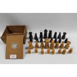 A VINTAGE TURNED WOODEN CHESS SET