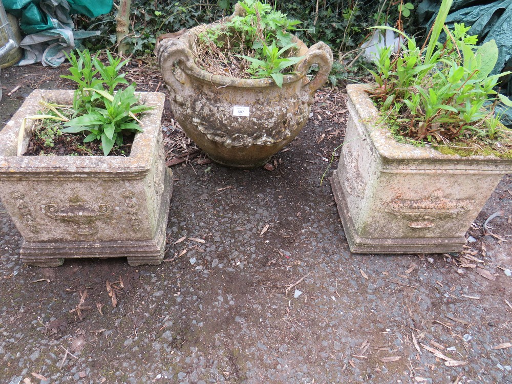 THREE DECORATIVE CONCRETE GARDEN PLANTERS