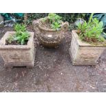 THREE DECORATIVE CONCRETE GARDEN PLANTERS