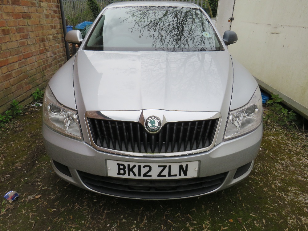 A 2012 SILVER 1.6L DIESEL SKODA OCTAVIA 'BK12 ZLN', LOG BOOK, ONE KEY, CURRENTLY SORN, MILEAGE AS