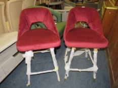A PAIR OF MODERN RED BAR STOOLS