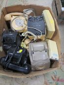 A TRAY OF VINTAGE TELEPHONES