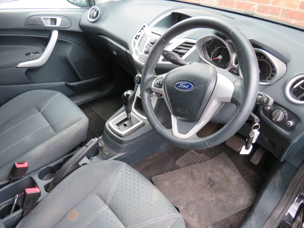 A BLACK 2011 1.4L PETROL FORD FIESTA 'BF61 HVR', LOG BOOK, TWO KEYS, CURRENTLY SORN, MILEAGE AT LAST - Image 9 of 12