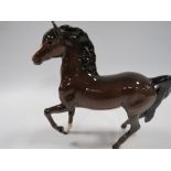 A SMALL ROYAL DOULTON FIGURE OF A HORSE