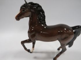 A SMALL ROYAL DOULTON FIGURE OF A HORSE