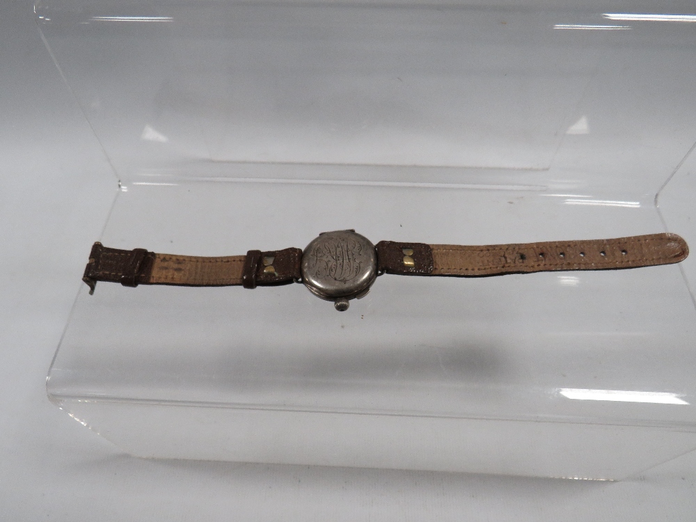 AN ANTIQUE TRENCH WRISTWATCH WITH SILVER HUNTING STYLE CASE - Image 4 of 4