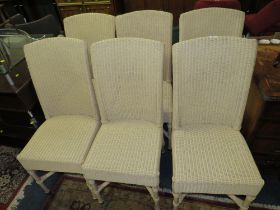 A SET OF SIX WICKER 'VINCENT SHEPPARD' CHAIRS