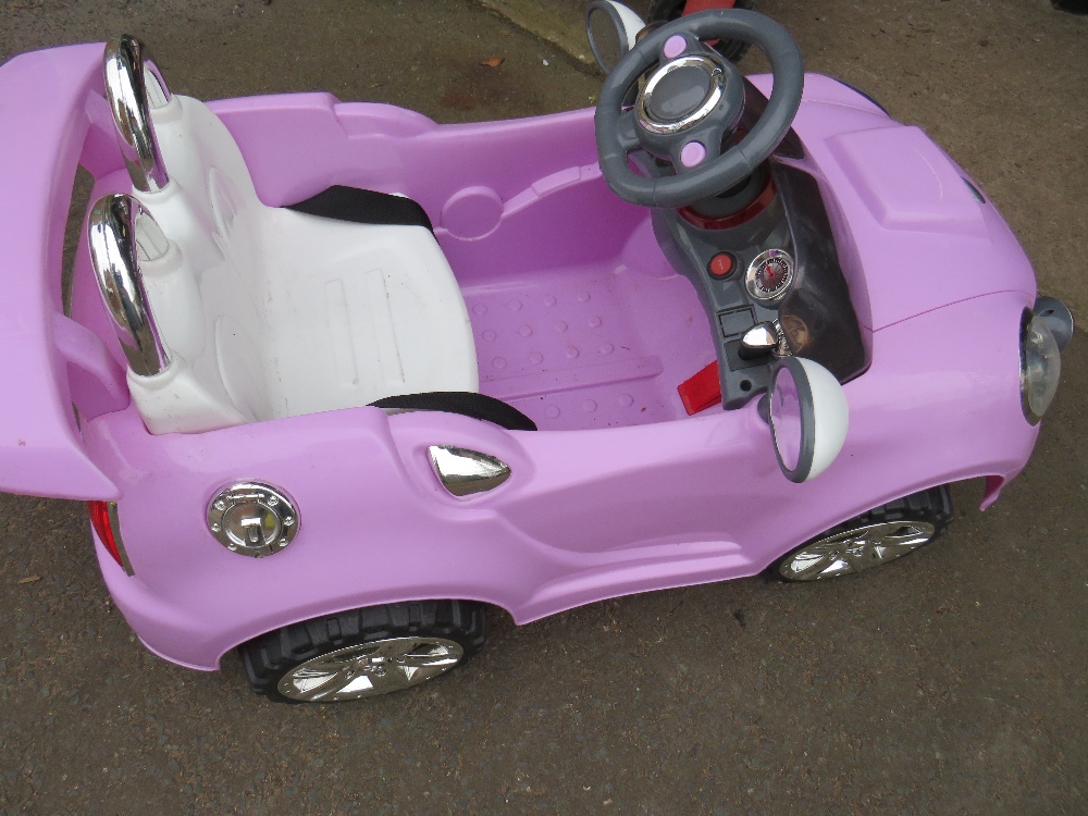 A CHILDS BATTERY RIDE ON CAR LILAC SPORTS MINI - (MISSING CHARGER) - Image 3 of 4