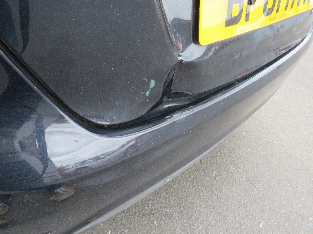A BLACK 2011 1.4L PETROL FORD FIESTA 'BF61 HVR', LOG BOOK, TWO KEYS, CURRENTLY SORN, MILEAGE AT LAST - Image 4 of 12