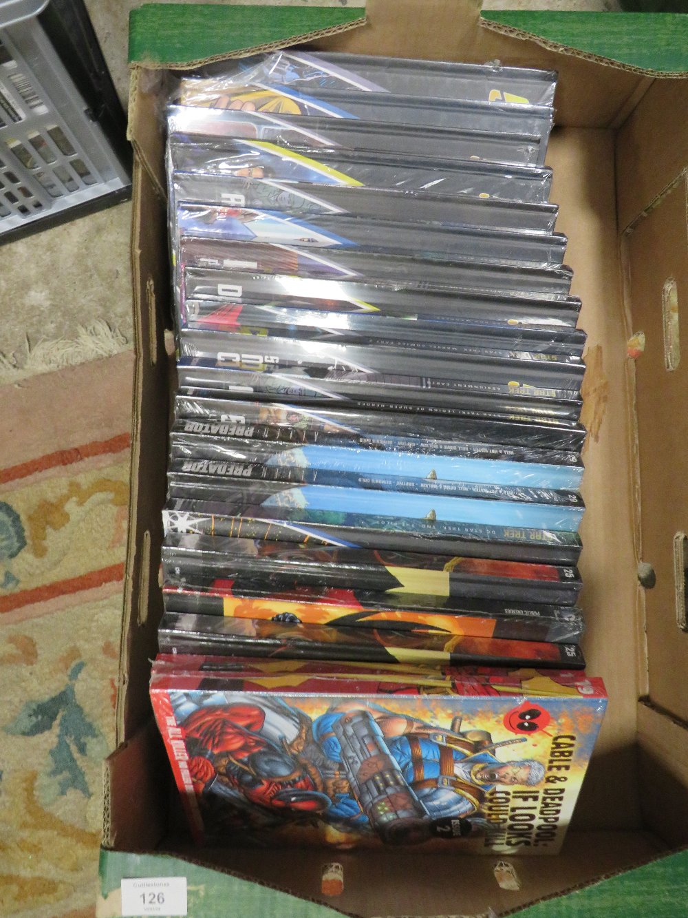 A TRAY CONTAINING TWENTY STAR TREK GRAPHIC NOVEL COLLECTION AND MARVEL / DC / DEADPOOL / PREDATOR